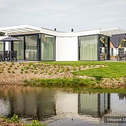 Vacation home Luxury family villa 8p in De Koog, Texel with beautiful view of pond.