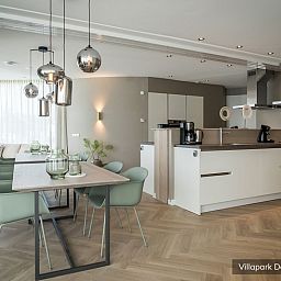 Spacious kitchen and dining area in Luxury family villa 8p, De Koog, Texel for a comfortable vacation.
