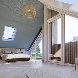 Spacious bedroom in Duinvilla Wellness 6, Texel, with large bed and lots of natural light.
