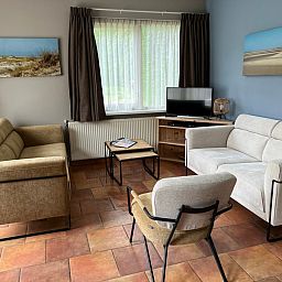 Cozy living room in Landgoed Springtij - Koetshuis 1, vacation home in De Koog, Texel.