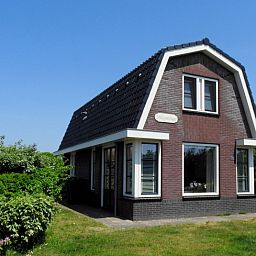 Ferienhaus Villa Magnifique in Den Burg, Texel: stilvoller Aussenbereich mit Garten und sonniger Lage.