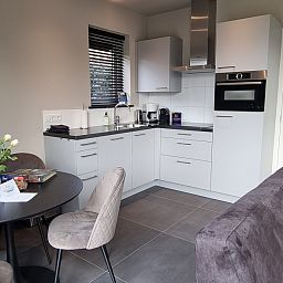 Stylish kitchen in vacation home Schoonoordsingel 29a, Den Burg, Texel, fully equipped for cooking.