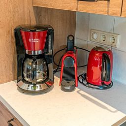 Coffee makers and kettle in the kitchen of Holiday home in Oosterend, Texel.