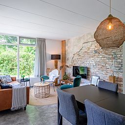 Bright and spacious indoor space with modern furnishings in Bungalowpark De Toes - Zeewier, Oosterend, Texel.
