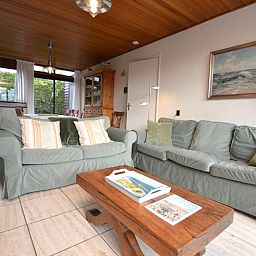 Spacious indoor area of Holiday home the Pearl 258, De Dennen, Texel with comfortable seating area.