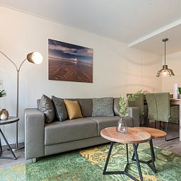 Stilvolle Einrichtung des Appartements Bos en Duin 32, De Dennen, Texel mit stimmungsvoller Dekoration.