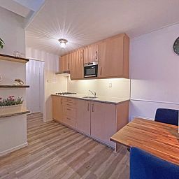 Comfortable double bedroom in Apartment Bos en Duin 27, De Dennen, Texel with a view of nature.