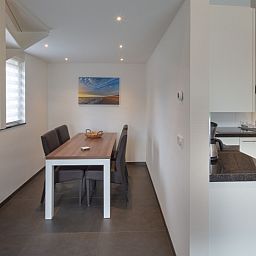 Eetruimte in vakantiehuis Gortersmient 224, Bungalowpark Gortersmient, De Dennen, Texel. Gezellig dineren op de Waddeneilanden.