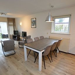 Dining area in Holiday home the Pearl 196, Texel, ideal for cozy dinners.
