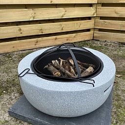 Geniessen Sie einen gemuetlichen Abend an der Feuerstelle im Vakantiepark De Bremakker - Chalet 1140 in De Dennen, Texel.