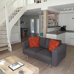 Modern open kitchen and living room in Holiday home Gortersmient 350, De Dennen, Texel.