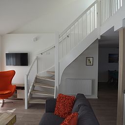 Stylish staircase and sitting area in Holiday home Gortersmient 350, De Dennen, Texel.