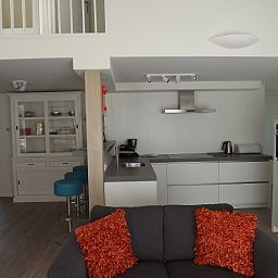 Sleek kitchen design in Holiday home Gortersmient 350, De Dennen, Texel, with modern appliances.