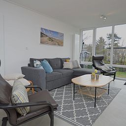 Bright interior of Tempelierweg 38, vacation home in De Dennen, Texel with comfortable seating.