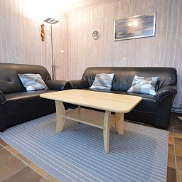 Gemuetliches, modern eingerichtetes Wohnzimmer im Ferienhaus Tempelierweg 37, De Dennen, Texel.