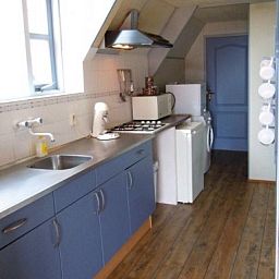 Moderne Kche in Havenzicht Wohnung, West-Terschelling, ideal fr einen komfortablen Aufenthalt.