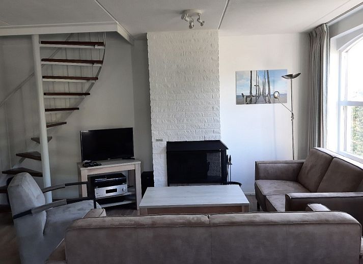 Bungalow 419 in De Cocksdorp on Texel with a sunny terrace and green surroundings.