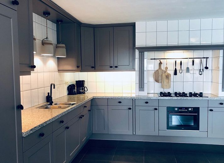 Stijlvolle woonkamer in Unieke 12 pers. Farm Lodge De Muy op Hoeve Vianen, De Cocksdorp, Texel.