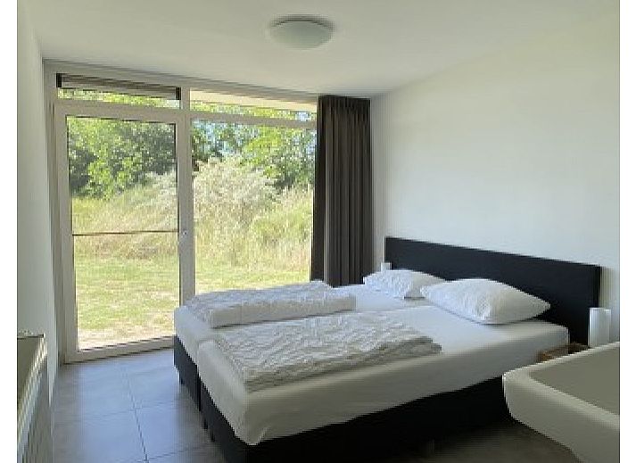 Gruene Umgebung von Luxe 8 persoons Golf Villa Texel in De Cocksdorp, ideal fuer Naturliebhaber.