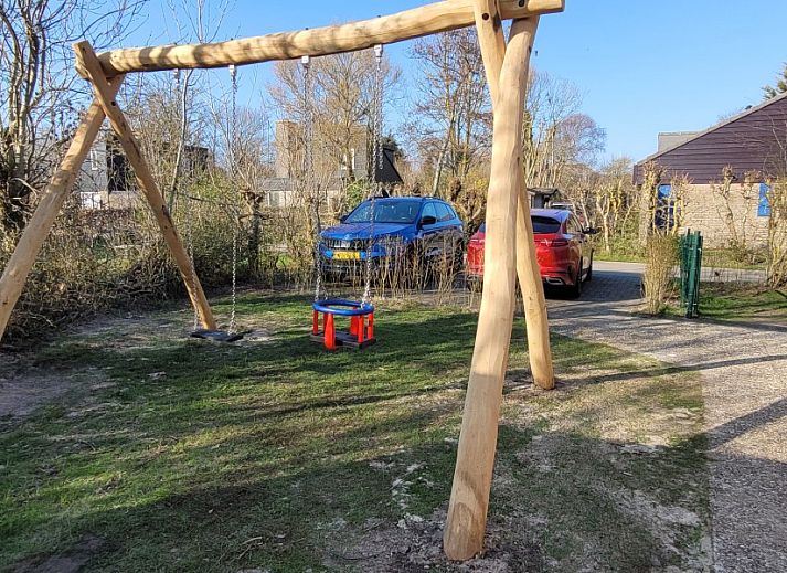 Geniet van de rust bij Het Eiland Gevoel, een vakantiehuis in De Cocksdorp, Texel, met een ruime tuin en speelruimte voor kinderen.