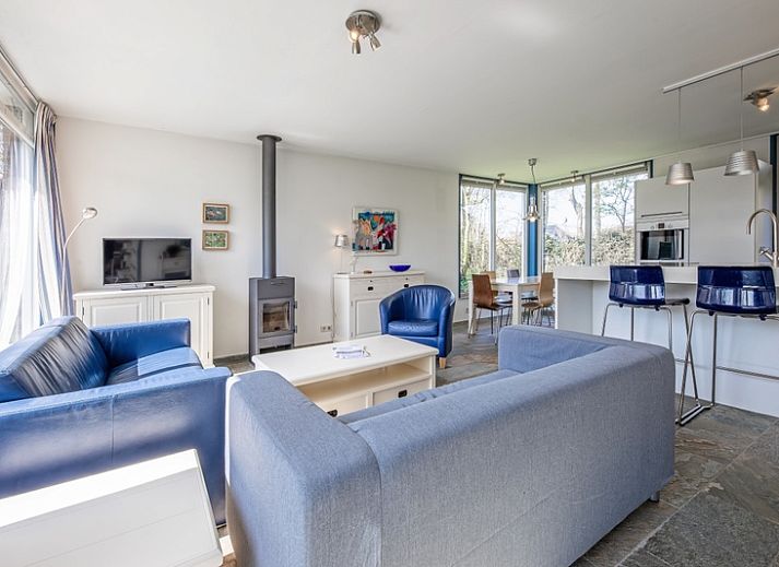 Vacation home Slufterhoek 034 in De Cocksdorp on Texel, spacious garden and terrace for relaxing stay.