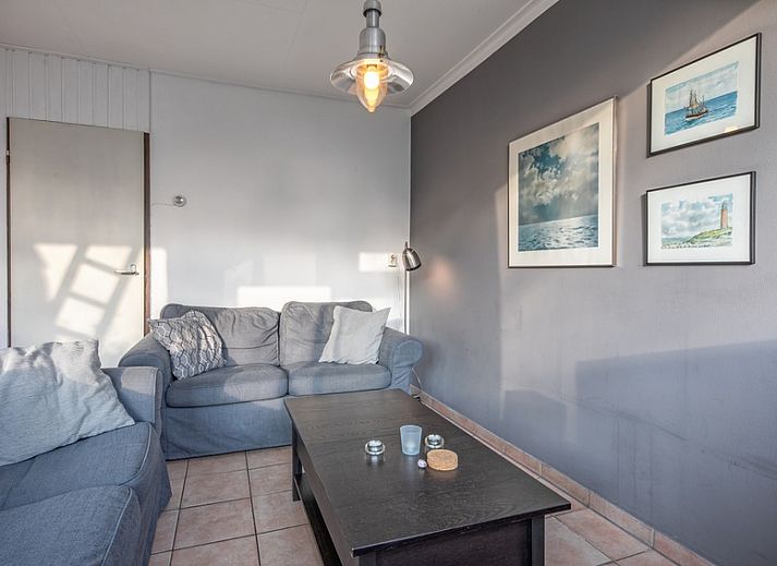 Geniessen Sie die Sonne auf der Terrasse des Ferienhauses Slufterhoek 114 in De Cocksdorp, Texel.