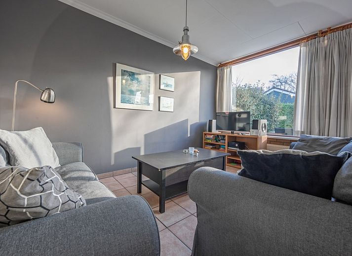 Geniessen Sie die Sonne auf der Terrasse des Ferienhauses Slufterhoek 114 in De Cocksdorp, Texel.