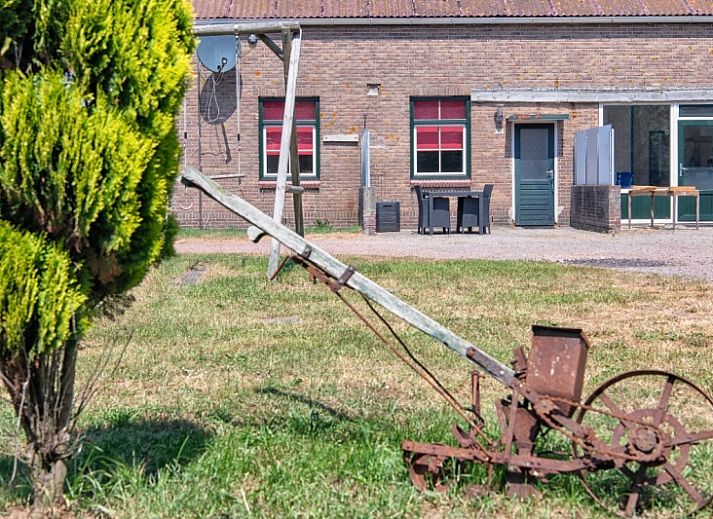 Under the lighthouse 113 vacation home in De Cocksdorp Texel with rustic garden and terrace for relaxing stay.