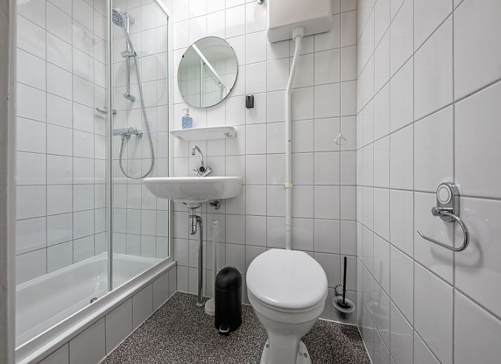 Terrace of Bungalow Duin aan Zee Texel at Bungalowpark Tamarisk, located in the serene surroundings of De Cocksdorp.