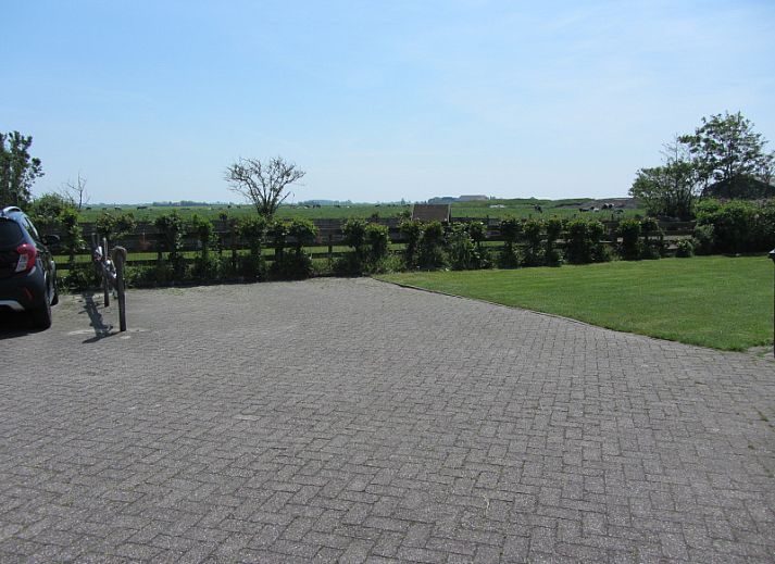 Komfortables Schlafzimmer mit zwei Betten im Ferienhaus Duinviooltje, De Cocksdorp, Texel.