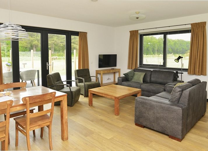 De Postschipper Ferienhaus in De Cocksdorp Texel mit Reetdach und Terrasse auf den Watteninseln.