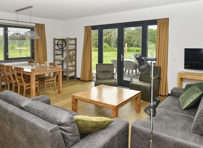 De Postschipper Ferienhaus in De Cocksdorp Texel mit Reetdach und Terrasse auf den Watteninseln.