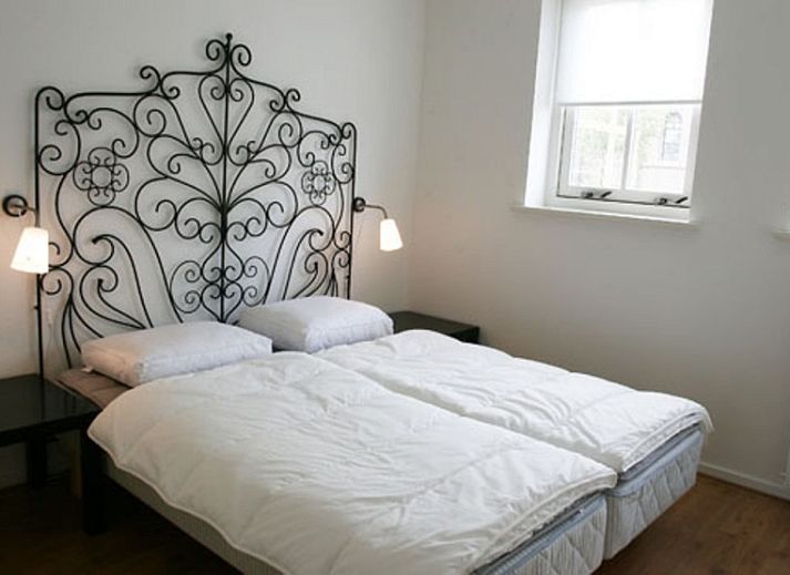 Typ 7 - 2107 Ferienhaus in De Cocksdorp Texel mit schoener Fassade und gruener Umgebung.