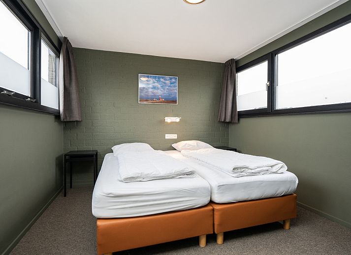 Geraeumiger Garten des Ferienhauses 30A in De Cocksdorp, Texel mit gruener Umgebung.