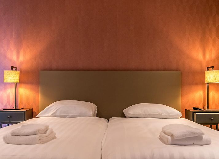 Gemuetliche Sitzecke im Princenhof 2, De Cocksdorp, Texel mit moderner Einrichtung und Fernseher.