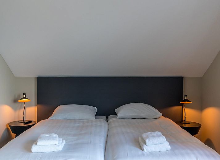 Gemuetliche Sitzecke im Princenhof 2, De Cocksdorp, Texel mit moderner Einrichtung und Fernseher.