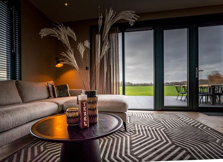 6 person vacation home in De Cocksdorp Texel with spacious garden and modern architecture.