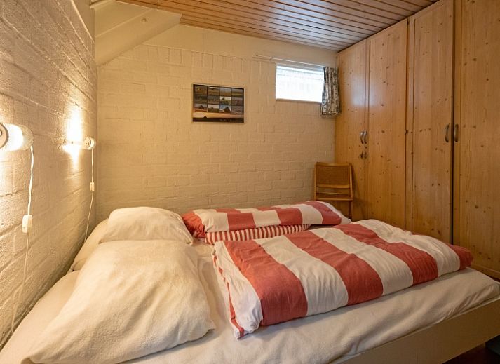 Cozy living room of Holiday home Slufterduin 108 in De Cocksdorp Texel, perfect for relaxation on the Wadden Islands.