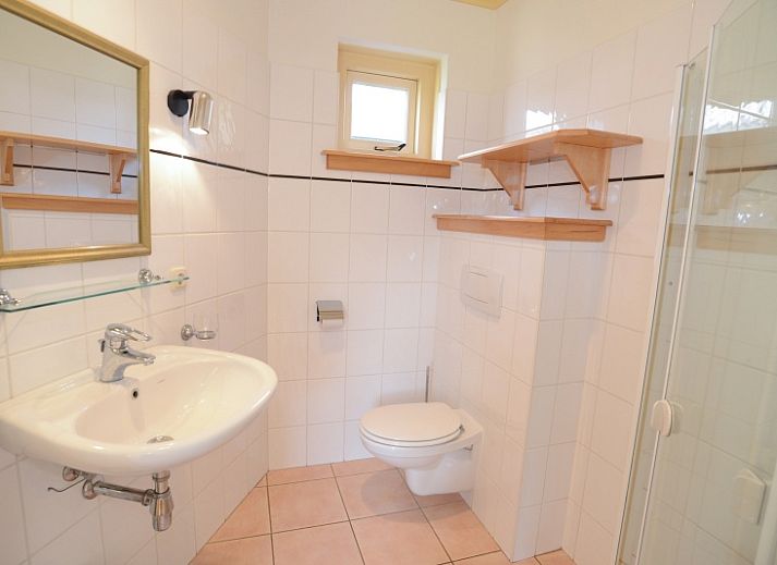 Gemuetliches Wohnzimmer des Ferienhauses De Velduil in De Cocksdorp Texel