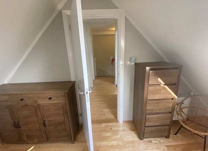 Spacious lawn at Holiday home in De Cocksdorp, Texel, Wadden Islands, perfect for outdoor activities.