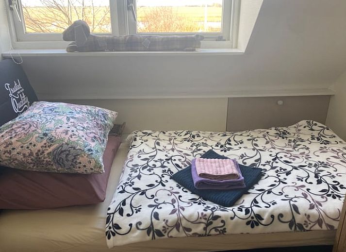 Parking and green area at Holiday home in De Cocksdorp, Texel, Wadden Islands with a view.