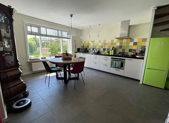 Parking and green area at Holiday home in De Cocksdorp, Texel, Wadden Islands with a view.
