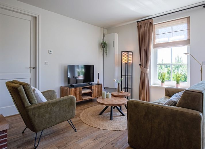 Wohnung A in De Cocksdorp, Texel mit sonniger Terrasse und Garten, ideal fuer einen entspannten Urlaub auf den Watteninseln.