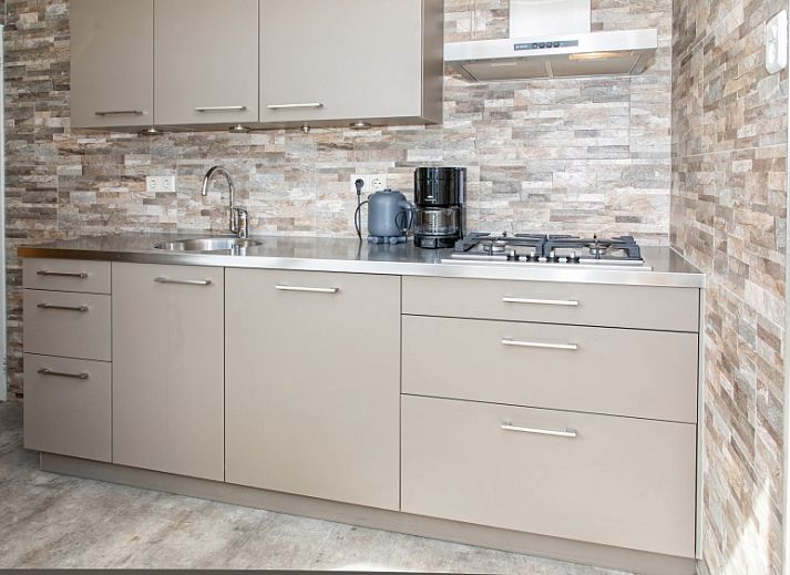 Bungalow Tamarisk 164 - Bartje in De Cocksdorp, Texel mit sonniger Terrasse und gruener Umgebung.