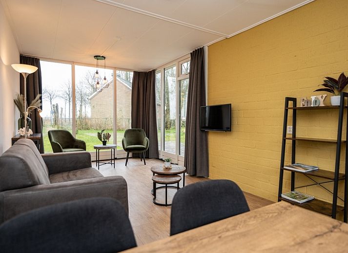 Vakantiehuis 34A in De Cocksdorp Texel met zonnig terras en groene omgeving.