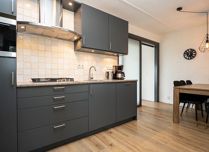 Vakantiehuis 34A in De Cocksdorp Texel met zonnig terras en groene omgeving.