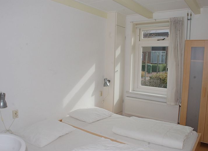 Cozy kitchen in Kikkertstraat 067, De Cocksdorp, Texel, complete with modern appliances.