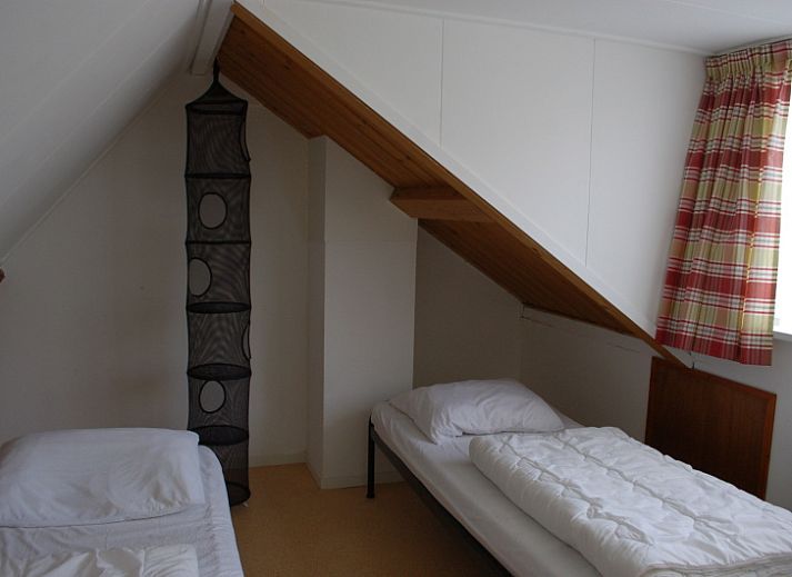 Cozy kitchen in Kikkertstraat 067, De Cocksdorp, Texel, complete with modern appliances.