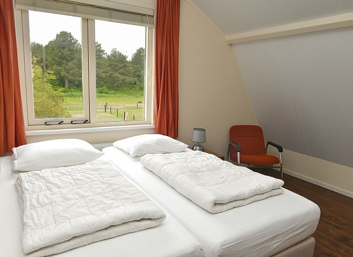 Charming vacation home Vuurtorenwachter, De Cocksdorp, Texel with spacious terrace and surrounding nature.