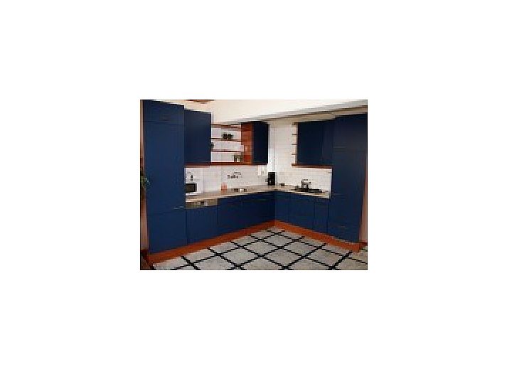 Spacious dining room in the Oorsprong, De Cocksdorp, Texel, vacation home with long table.